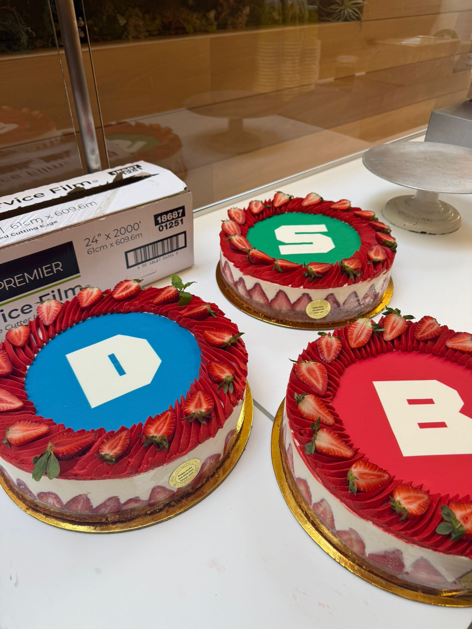 Three Browserbase cakes labelled D, S, and B